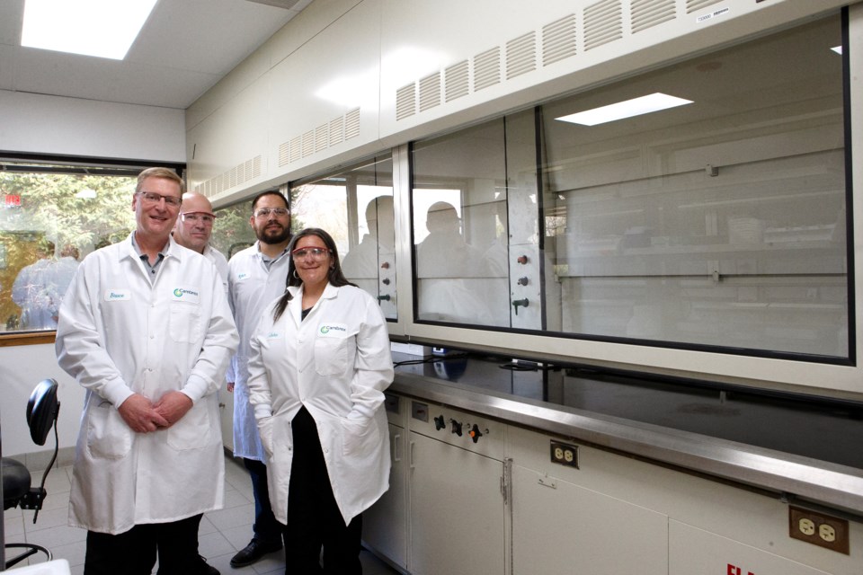 Staff at Cambrex Corporationâs Longmont site stand next to a recommissioned fume hood on May 13. Staff from left to right, Vice President and Site Director Bruce Johnson, Director of Facilities and Environmental Health and Safety for Cambrex in Longmont Michael Andretich, Associate Director of Anaylitcal Services Tyler Thigpen and Anaylitical Manager Heidi Steele.  Photo by Ali Mai | ali.mai.journo@gmail.com