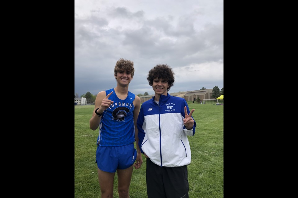 Connor McCormick (left) and Dom Warner (right) pose after breaking school record