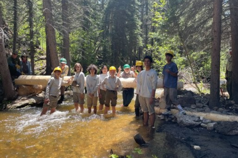 High School Leadership Corps members are recruited from students in Colorado. The eight-member crew from the June session worked with Poudre Wilderness Volunteers to build a log bridge across Little Beaver Creek in the Comanche Wilderness