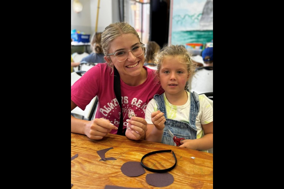 A young club member gets is seen with a BGC North Simcoe staffer.