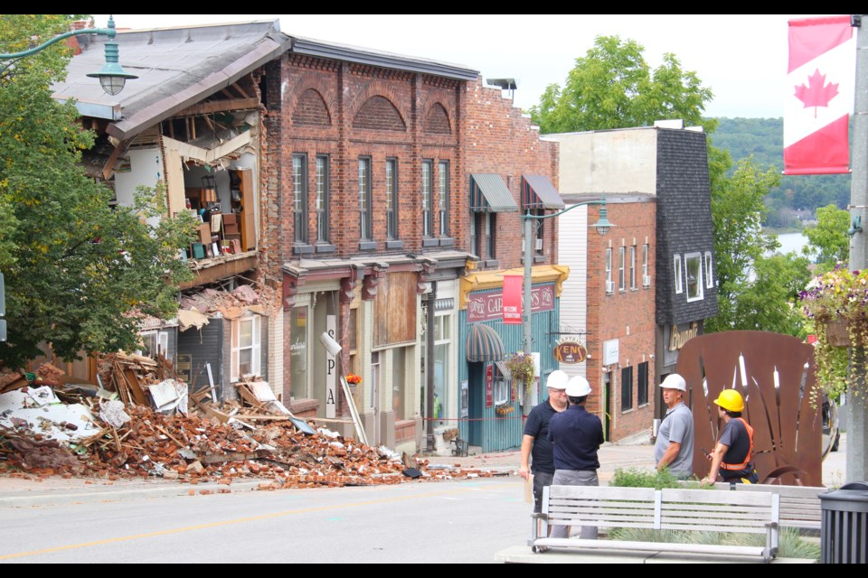 A portion of an historic building at 78 Main St. in Penetanguishene collapsed before dawn Thursday, displacing 14 people, none of whom were injured.