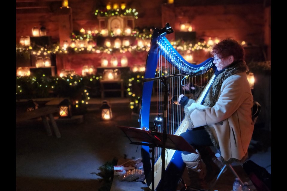 Ruth Sutherland playing Celtic harp creates a soothing ambience in the historic Church of Saint-Joseph.