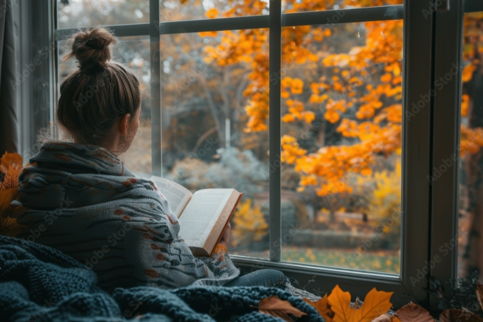 20241108-woman-in-cozy-blanket-by-window(1)