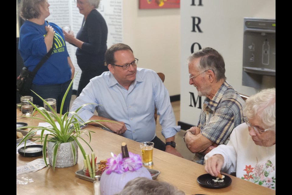 Green Party Leader Mike Schreiner chatted with local residents during a stop in Midland on Friday.