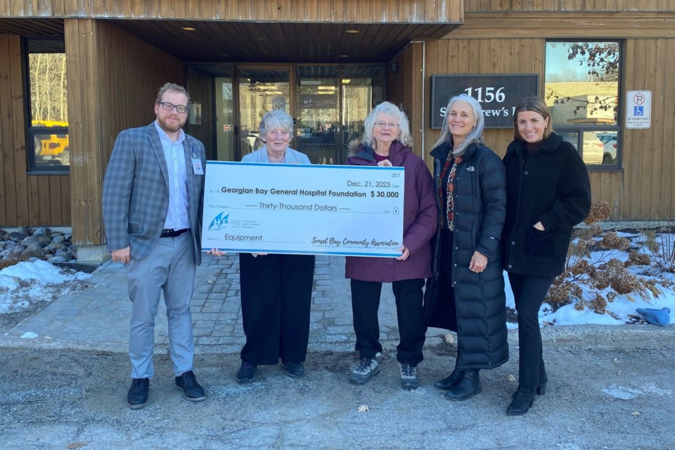 The Sunset Bay Community Association donated $30,000 to the Georgian Bay General Hospital Foundation. From left are Matthew Lawson, hospital president and CEO, Jan Waterfield and Linda Vermeersch, Sunset Bay Community Association members, Jennifer Johnson, director with the hospital foundation board, and Victoria Evans, community giving officer with the hospital foundation.