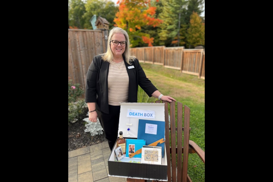 Hospice Huronia supportive care coordinator Tammy Vaters is pictured beside her death box.