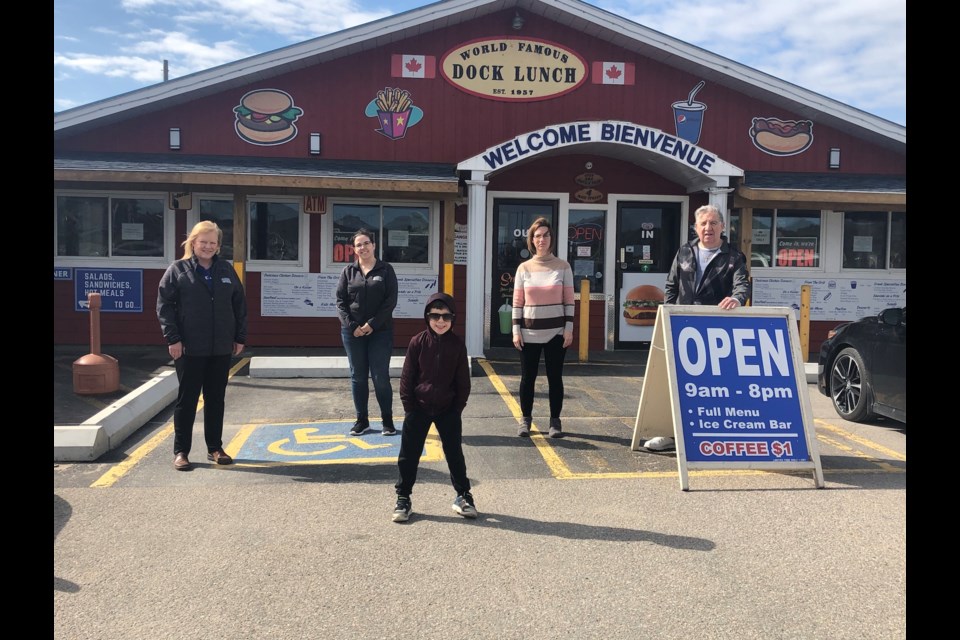 The World Famous Dock Lunch restaurant in Penetanguishene hosted Front-Line Friday last month to honour health-care workers and raise funds for Georgian Bay General Hospital. Through the sale of special meal deals, restaurant owners Nick and Marina Boudouris donated $1,000 to the GBGH Foundation. From left: Cindy Robitaille, Danielle Mestre, Johnny, Meaghan Sykes and Nick Boudouris from The
World Famous Dock Lunch Restaurant. Contributed photo