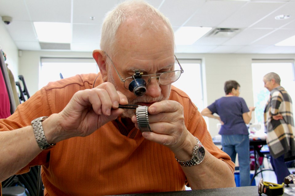 Retired store owner Dietmar Schafer volunteers his expertise at fixing watches, clocks and other things at the Askennonia Senior Centre twice a month. 