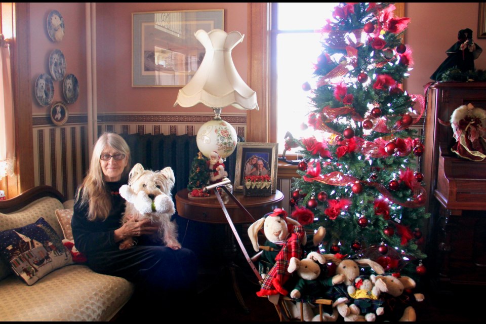 Lorelei Smith, seen with her West Highland terrier Gordie, is opening her Midland heritage for the Dec. 7 Christmas Home Tour, benefitting the Huronia Museum.