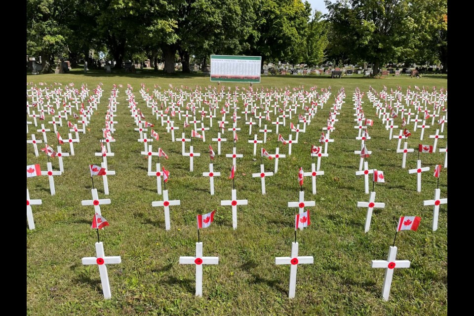 Rows of small crosses serve to remember the fallen at Lakeview Cemetery in Midland.