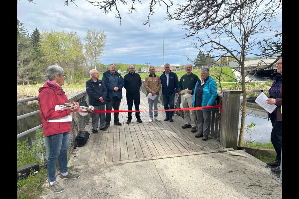 Ganaraska Hiking Trail Association president Frieda Baldwin, right, is pictured with local municipal officials along with Larry Piitz, past president of the Midland hiking club during the official opening of the new section of trail.