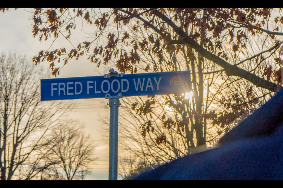 A new sign at Tiffin Park, a stone's throw from ball diamond, honours former Midland CAO Fred Flood.