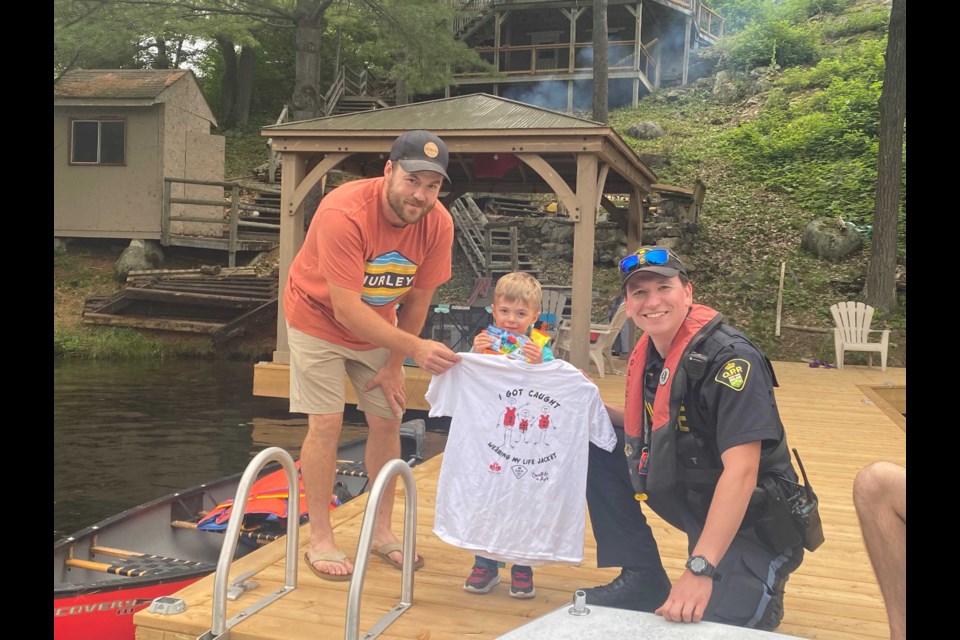 Southern Georgian Bay OPP recently handed out T-shirts to youngsters who were wearing life-jackets.