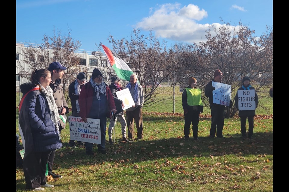 Protesters targeted Midland plant Raytheon ELCAN over its ties to military weaponry.