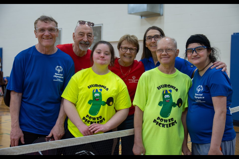 Kitchener Waterloo member Robert Greig, Waterloo coach Murf Johnston, Huronia Power Picklers Abigail Kunkel and Frank Dunphy, Waterloo coach Carol Johnston, Huronia coach Rhonda Bailey, and Kitchener Waterloo team member Kathleen Sgro show pose for photo together.