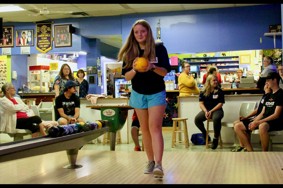 Dennie Belcourt, 14, is seen bowling with the Midland Youth Bowling league at Bayshore Lanes. 