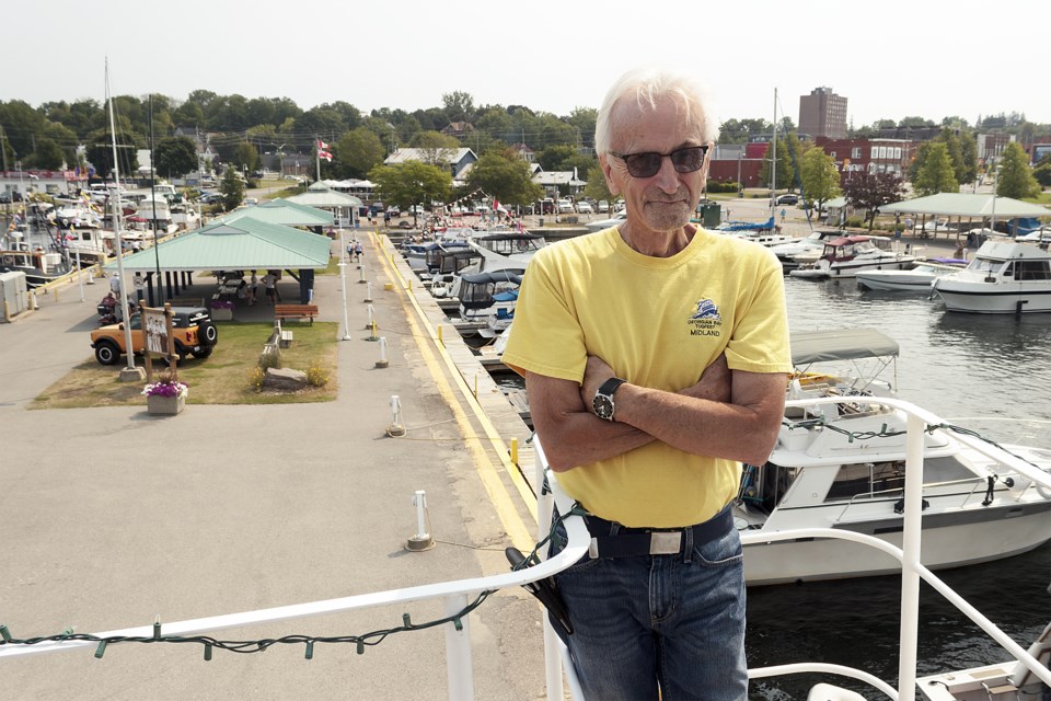 Paul Gaynor, committee member for Tugfest, provides a crow's nest view of Midland town dock where over 20 tugboats will be this weekend.