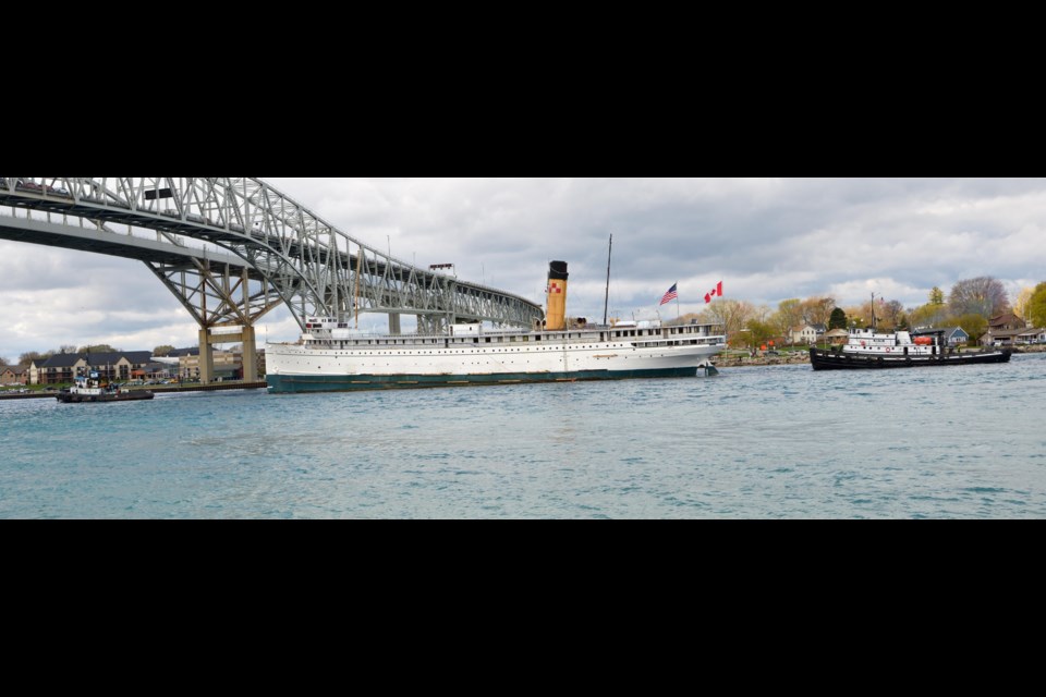 The SS Keewatin passed under the Blue Water Bridge as it leaves Lake Huron and travels along the St. Clair River.