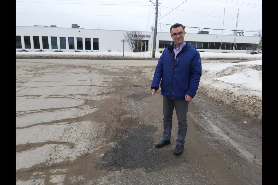 Bryan Murray, director of public works, Town of Penetanguishene, stands next to a freshly patched pothole on a sideroad off of Centennial Drive. Mehreen Shahid/MidlandToday