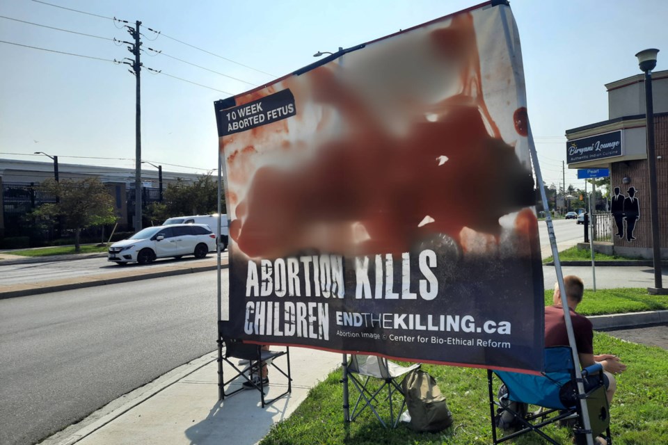 A graphic anti-abortion sign is currently on display at Main and Ontario streets.