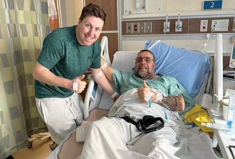 Travis Gerrits check in on his kidney transplant recipient, Carlos Sousa.