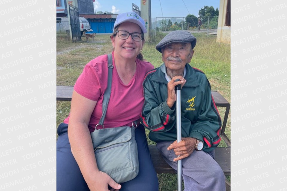 Sheila Hainsworth meets one of Nepal residents who had his eyes examined at the camp and received free cataract surgery.