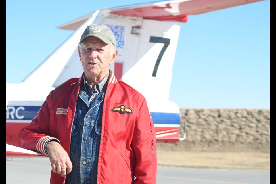 Harry Chapin stands near a Snowbirds' plane with a No. 7 designation, which is the same designation under which he flew with the Snowbirds in the 1970s. Photo by Jason G. Antonio