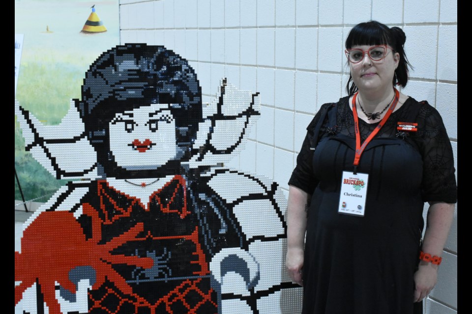 “Spider Lady” was the creation of Lego builder Christina Wilkinson (right), who many in the Lego community may know best by the handle “Spooky Brick Lady.”