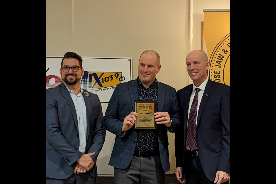 Eric Campbell accepts his plaque for 2022 Citizen of the Year