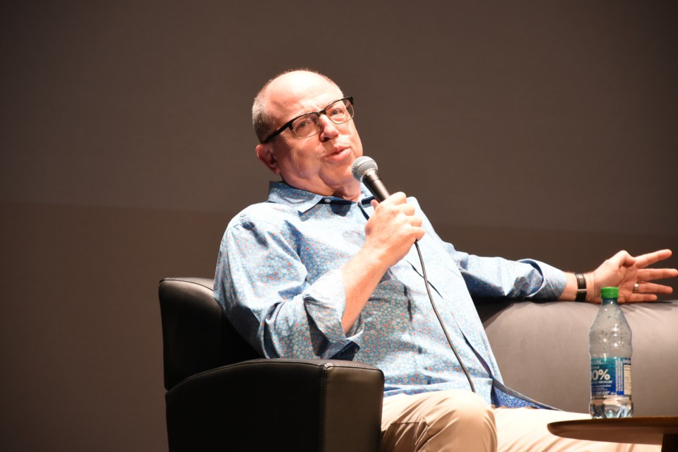 Brent Butt, of Corner Gas fame, attends a presentation at the Mae Wilson Theatre on Saturday night. During his presentation, which was moderated by Rob Carnie, Butt delivered live comedy and answered questions about his new book, "Huge."