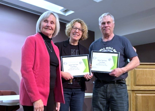 Left to right: Gayle Jones (left) representing the Friendly City Optimist Club and first place winners Cherie Esson and Stu Esson (right).