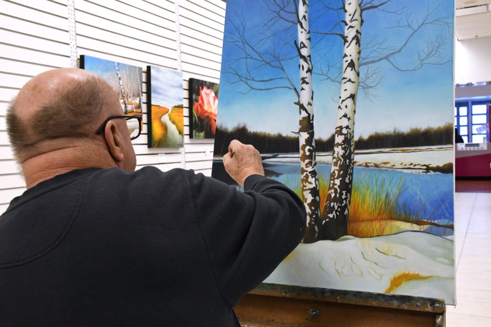 Gary Holden (pictured) works on his latest creation at the Town ‘N’ Country Mall on Feb. 13. A new member of the Moose Jaw Art Guild, Holden describes his style as classical realism and works strictly in oils.