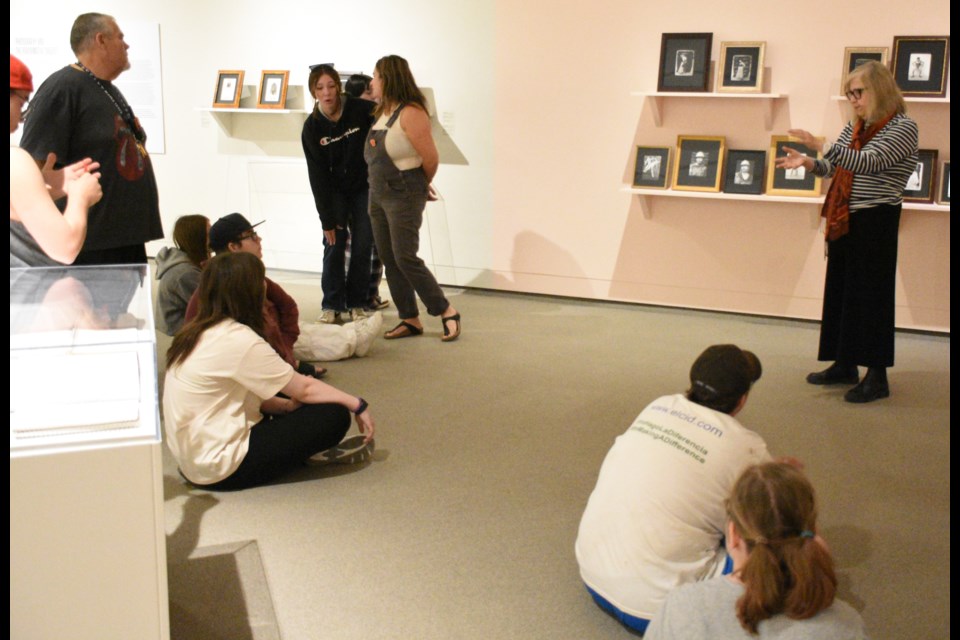 Artist Lessa Streifler discusses her work with students from Riverview Collegiate. Photo by Jason G. Antonio