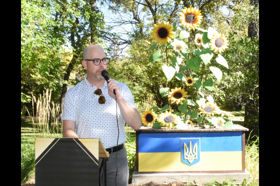 Craig Hemingway, marketing co-ordinator for the Downtown Moose Jaw Association, MCs the unveiling ceremony. Photo by Jason G. Antonio