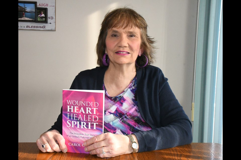 Resident Carol Carley has written a book about her turbulent childhood, how God cared for her during those trying times and her eventual acceptance of Jesus Christ as her saviour. Photo by Jason G. Antonio