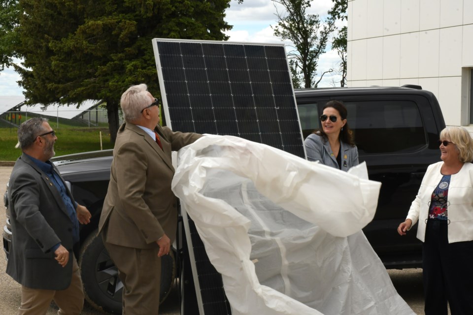 The formal unveiling of the Buffalo Pound Water Treatment Plant's new solar array on June 18. Left to right: Ryan Johnson, Clive Tolley, Sandra Masters, and Patricia Wasaba.