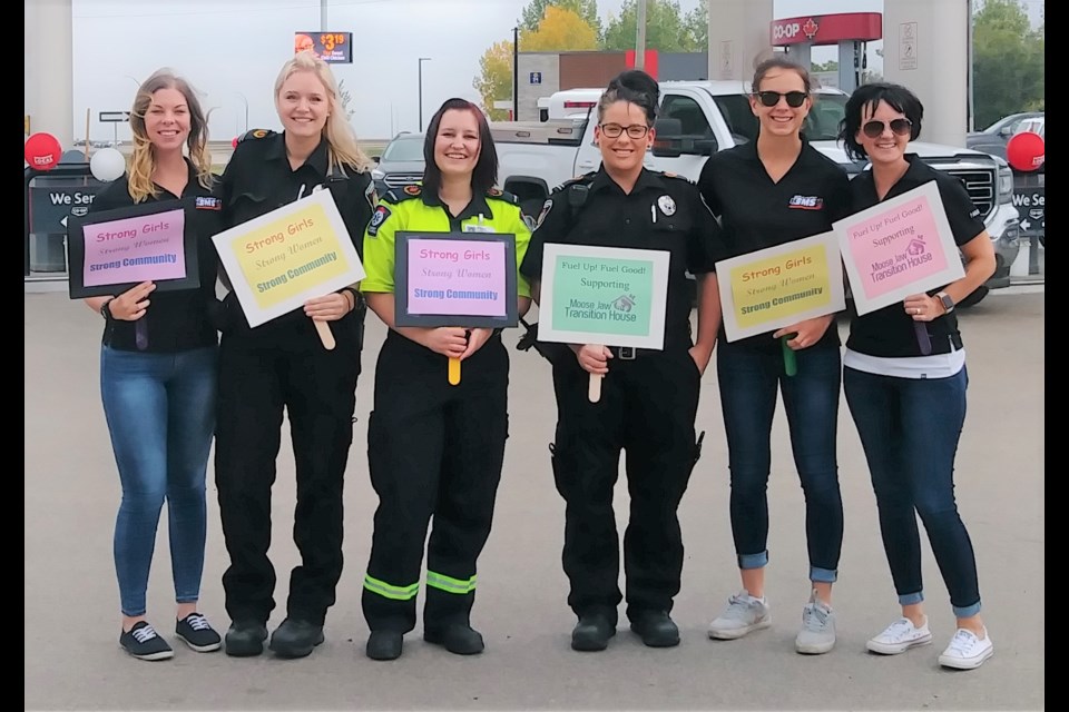 Employees from Moose Jaw EMS do their best to pump up drivers and encourage them to support the Co-op’s Fuel Good Day, as all funds raised went to Transition House. Photo courtesy Jenn Angus