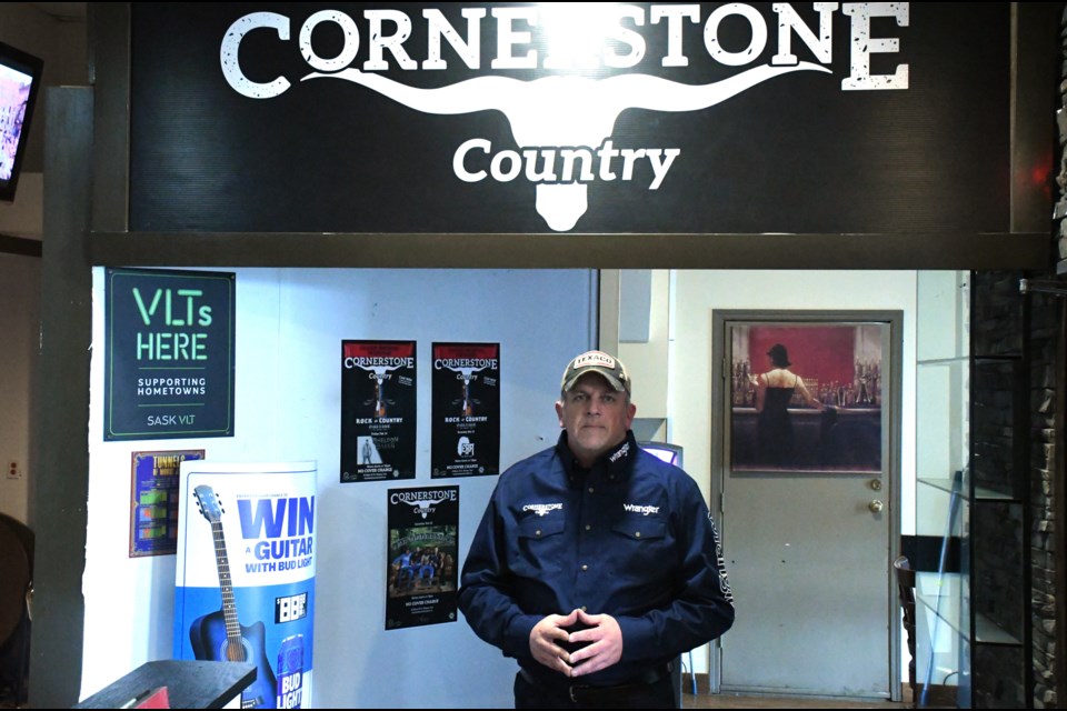 Larry Baker (pictured) is realizing his dream of owning a country music bar after serving 28 years in law enforcement and as a fire chief in the province.