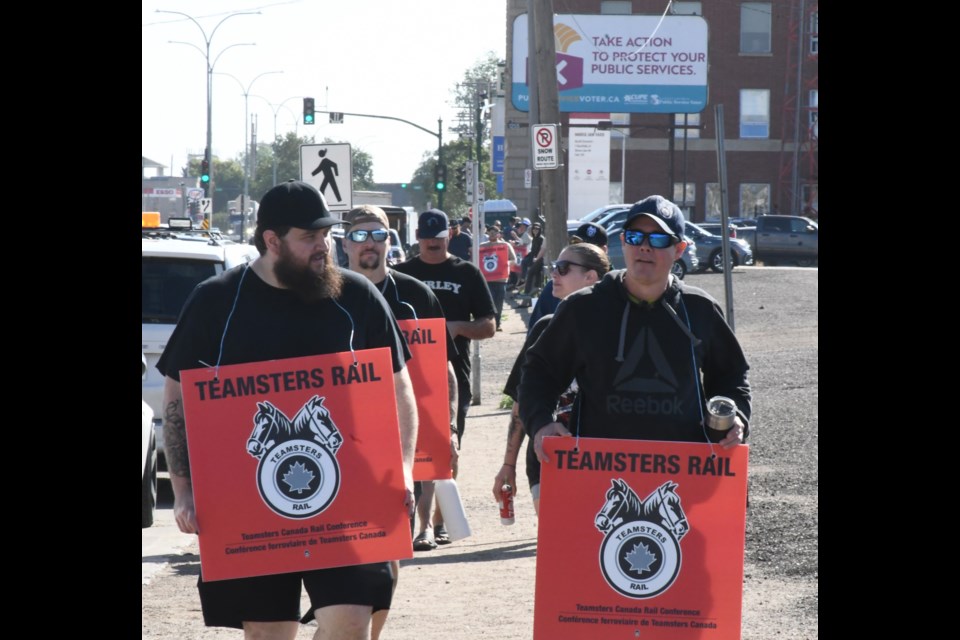 Locomotive engineers with Canadian Pacific Kansas City (CPKC) picket in front of the railyards on Aug. 22, the first day of the lockout. Photo by Jason G. Antonio