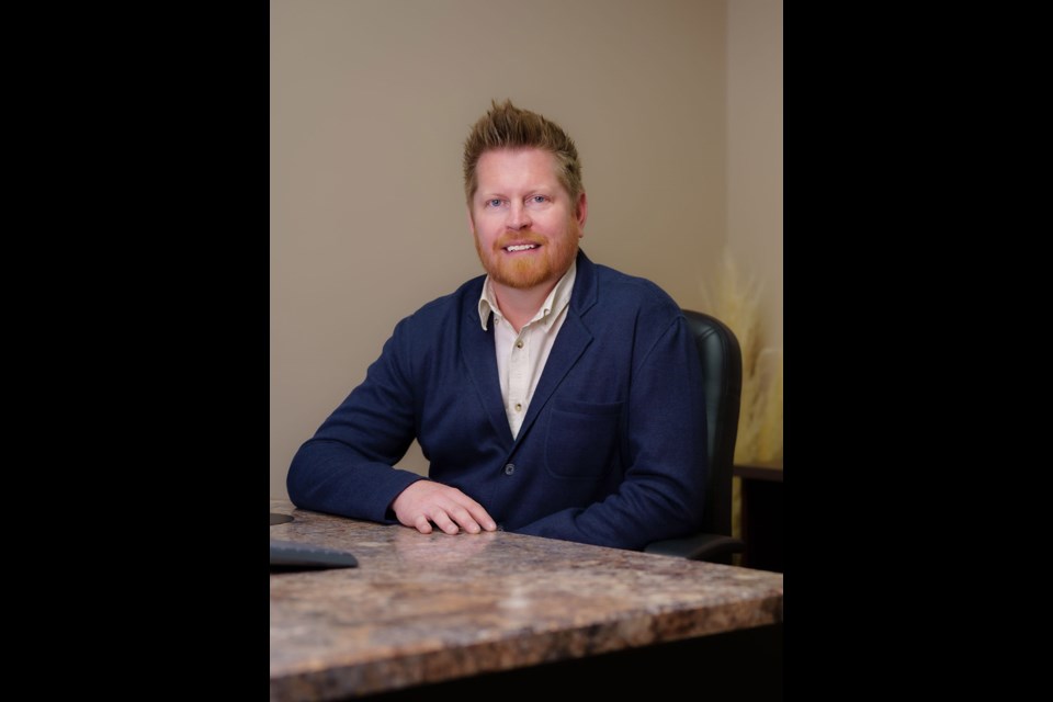 Derek McRitchie, owner of the two local brokerages.

