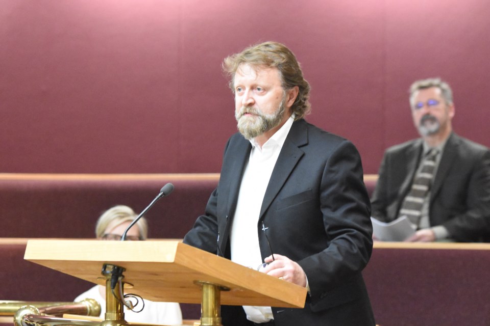 Tim Mack, CEO/president of MackSun Solar Corporation, speaks to city council on May 27. Photo by Jason G. Antonio 