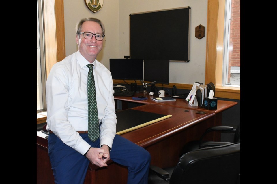 Mayor James Murdock poses inside his new office at city hall. Photo by Jason G. Antonio