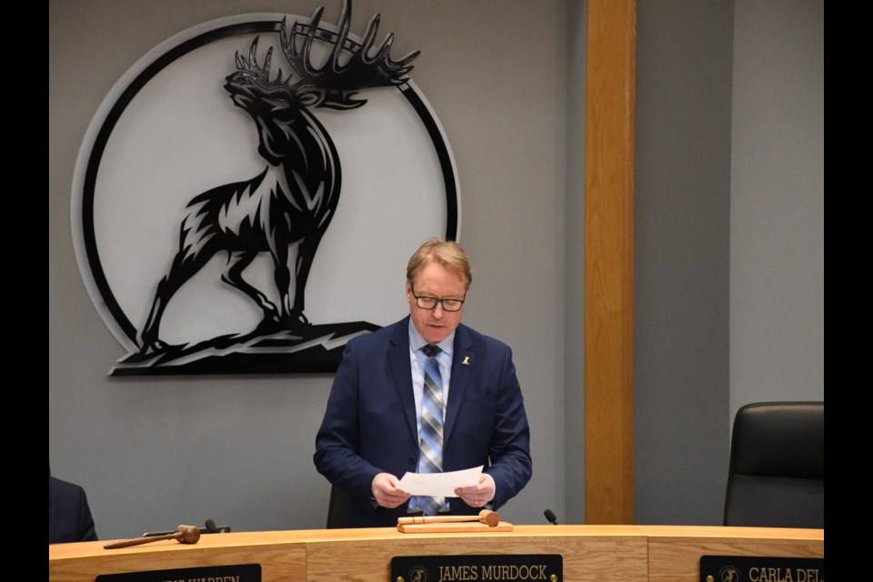 Mayor James Murdock acknowledges the death of Mary Dell Findlay, a former city councillor, during a recent meeting. Photo by Jason G. Antonio