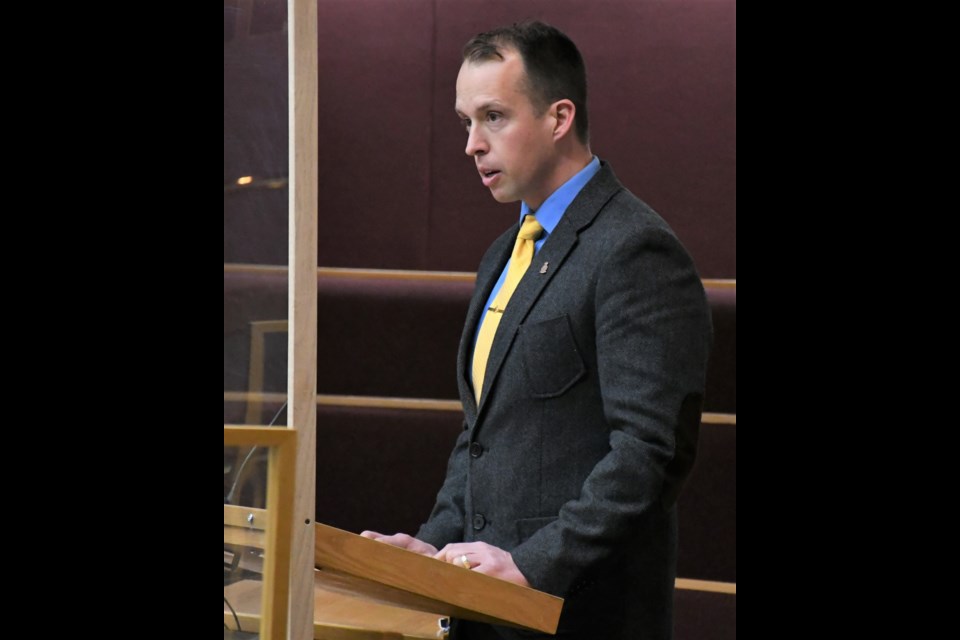 Retired soldier John Thomson speaks to city council on Feb. 28. Photo by Jason G. Antonio 