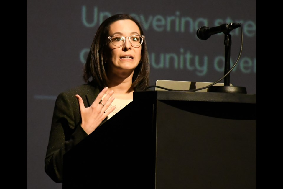 Dr. Laura Wright, a sociologist from the University of Saskatchewan, speaks about demographics during a presentation at the Mae Wilson Theatre. Photo by Jason G. Antonio