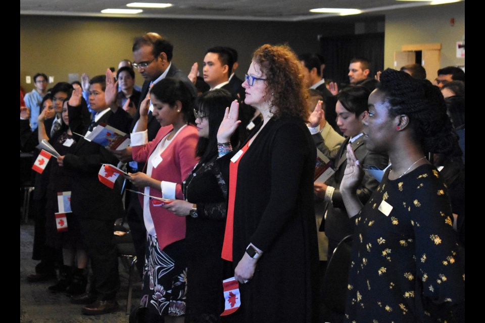 Tuesday, 47 new Canadians took the oath of citizenship at Mosaic Place. (Matthew Gourlie photograph)