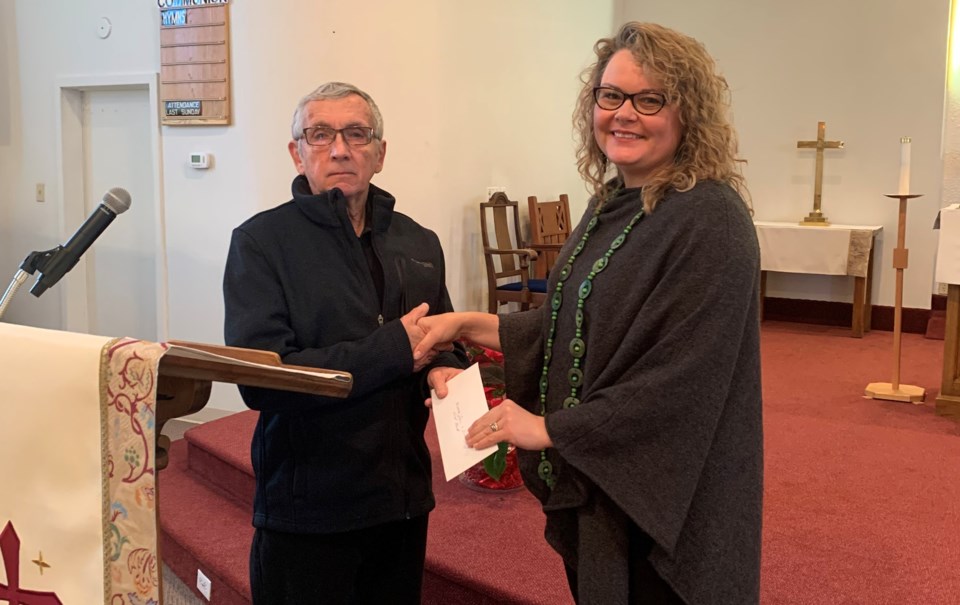 Presentation of cheque from Central Lutheran Church to Moose Jaw and District Food Bank