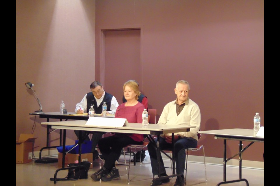 Moose Jaw Superannuated Teachers spell their way to the top, with the judges in the background.                                 