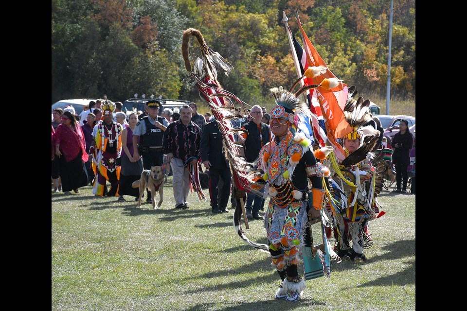 Dignitaries are led into the pow wow ring during the grand entry on Saturday afternoon.