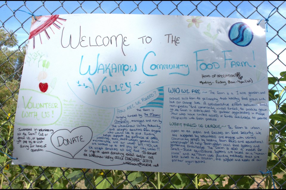 A sign welcomes people to the Mosaic Community Food Farm in Wakamow Valley. Photo by Jason G. Antonio